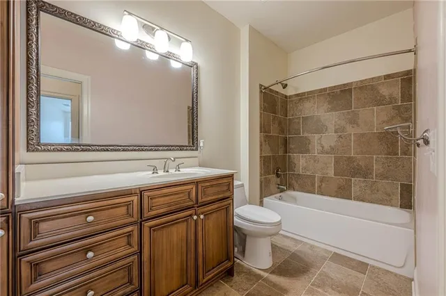 a front view of a building and a yard