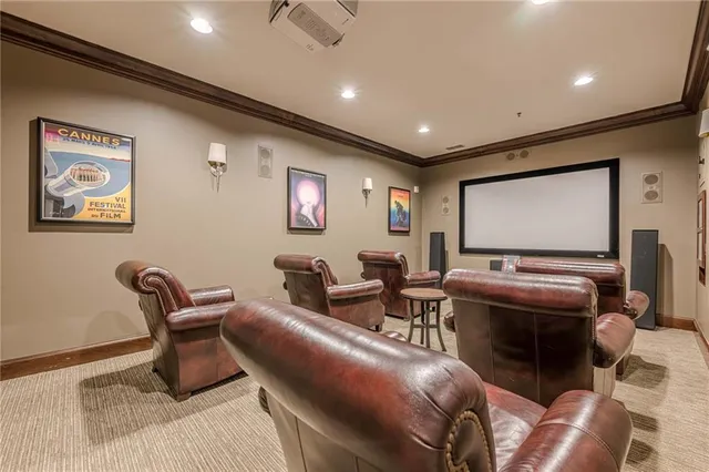 a large room with gym equipment and mirrors