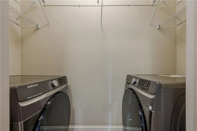 a utility room with dryer and washer