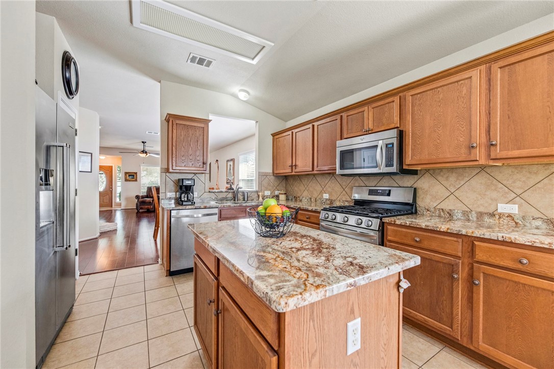 14305 Rountree Ranch Lane Austin, TX 78717 - Photo 1 of 1 kitchen is open to family room.