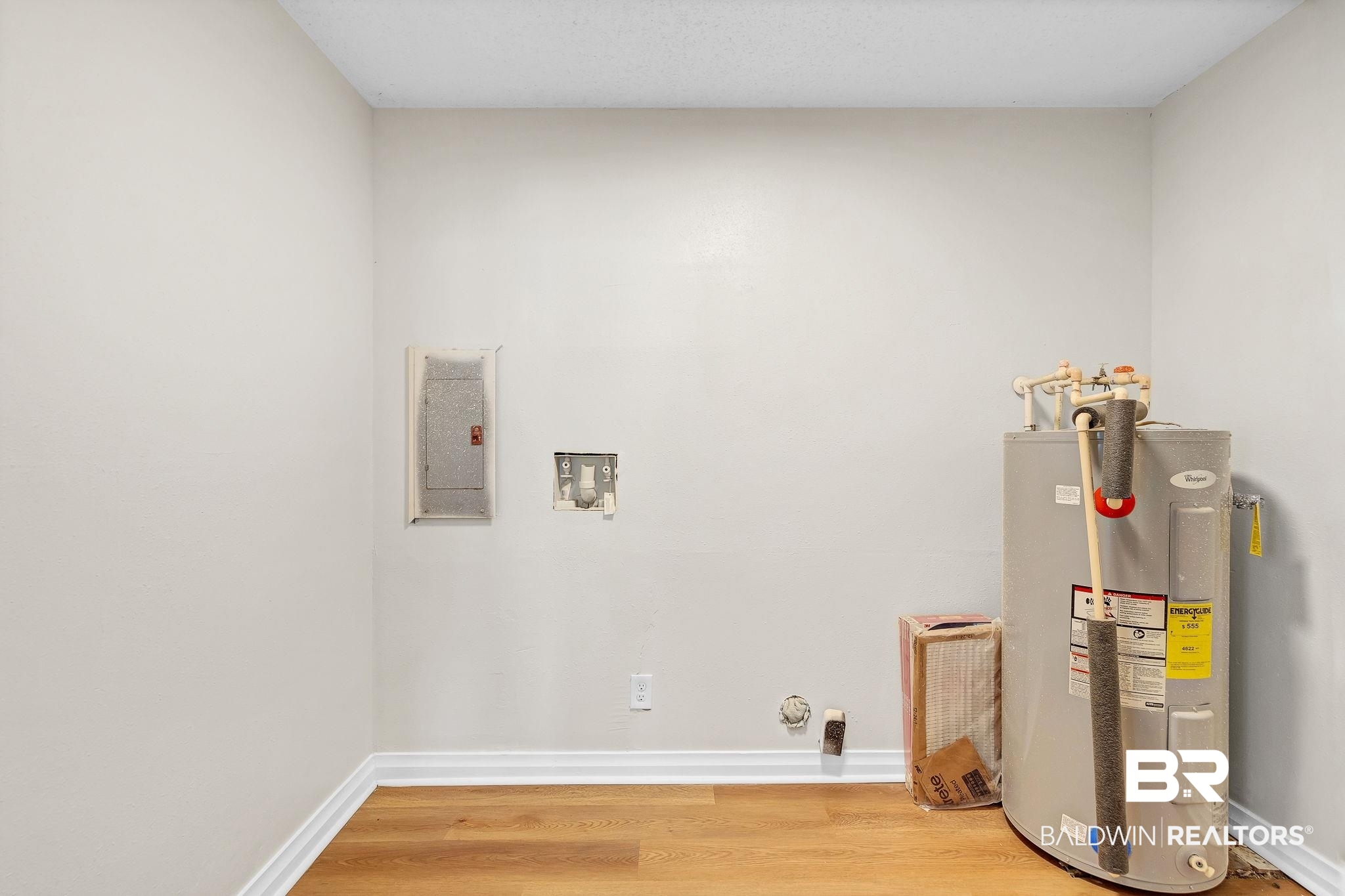 11964 Stroh Road Daphne, AL 36527 - Photo 43 of 58 Utility room featuring electric water heater and electric panel