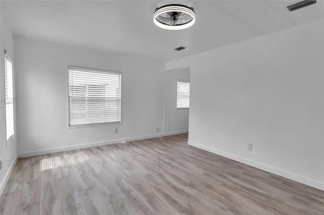 an empty room with windows