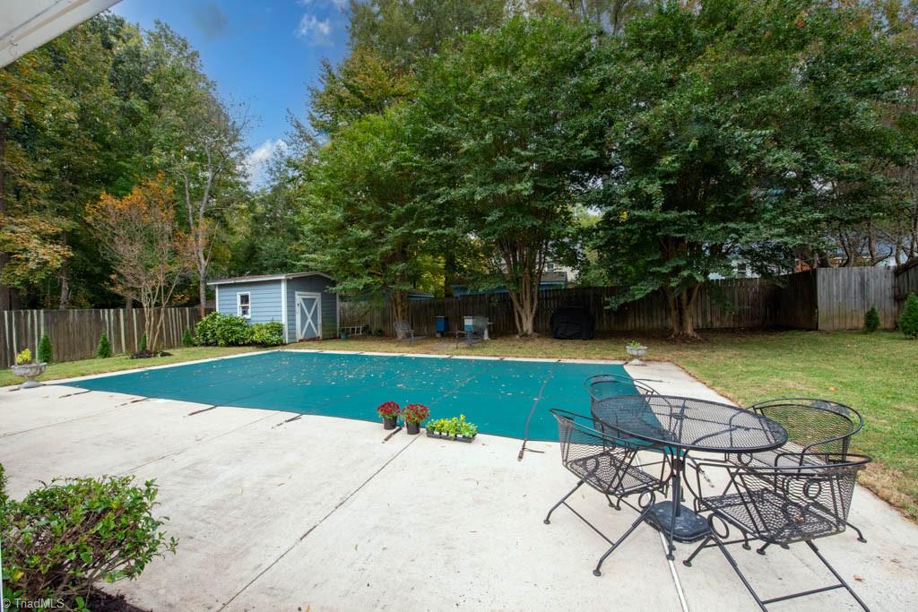 5107 Nantucket Road Greensboro, NC 27455 - Photo 47 of 50 Pool area & Screened in Porch