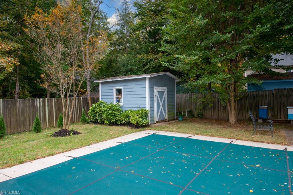 5107 Nantucket Road Greensboro, NC 27455 - Photo 48 of 50 Pool area & Storage Building