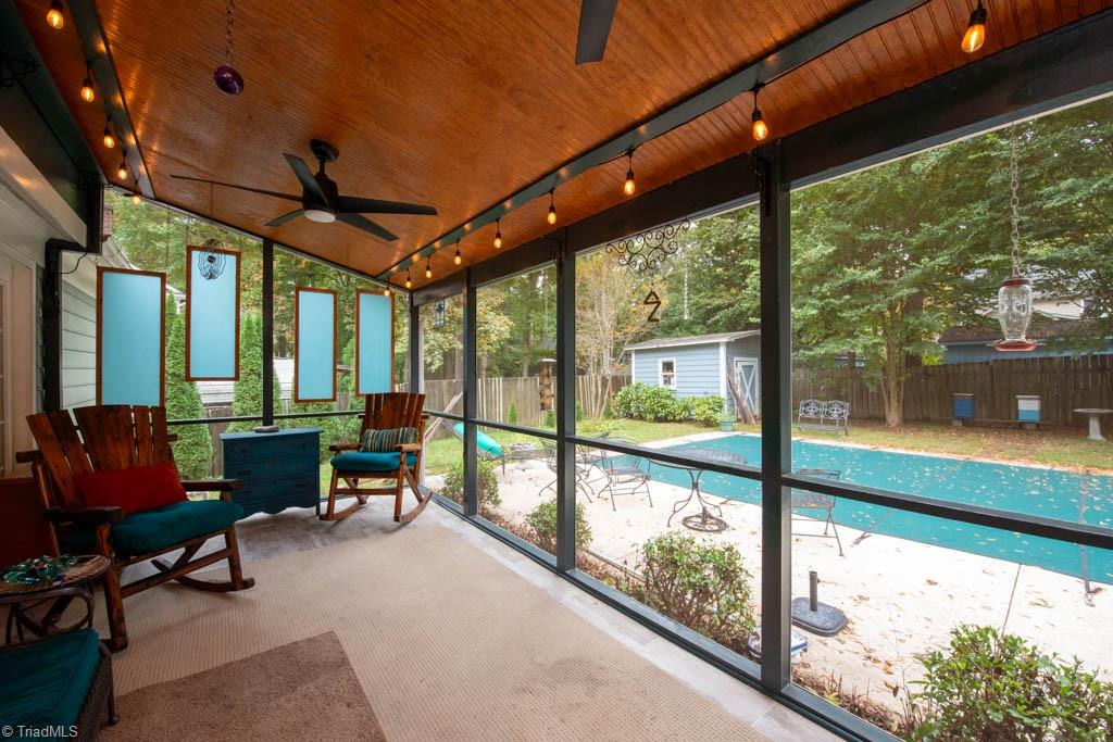 5107 Nantucket Road Greensboro, NC 27455 - Photo 5 of 50 Screened In Porch with view of pool