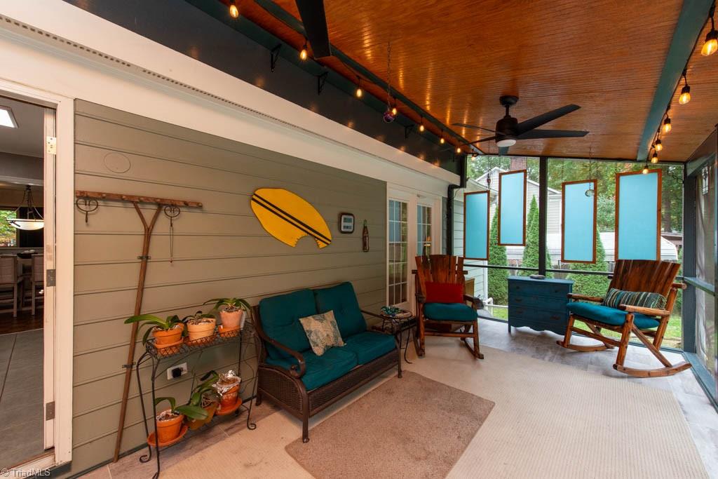 5107 Nantucket Road Greensboro, NC 27455 - Photo 6 of 50 Screened In Porch with view of pool