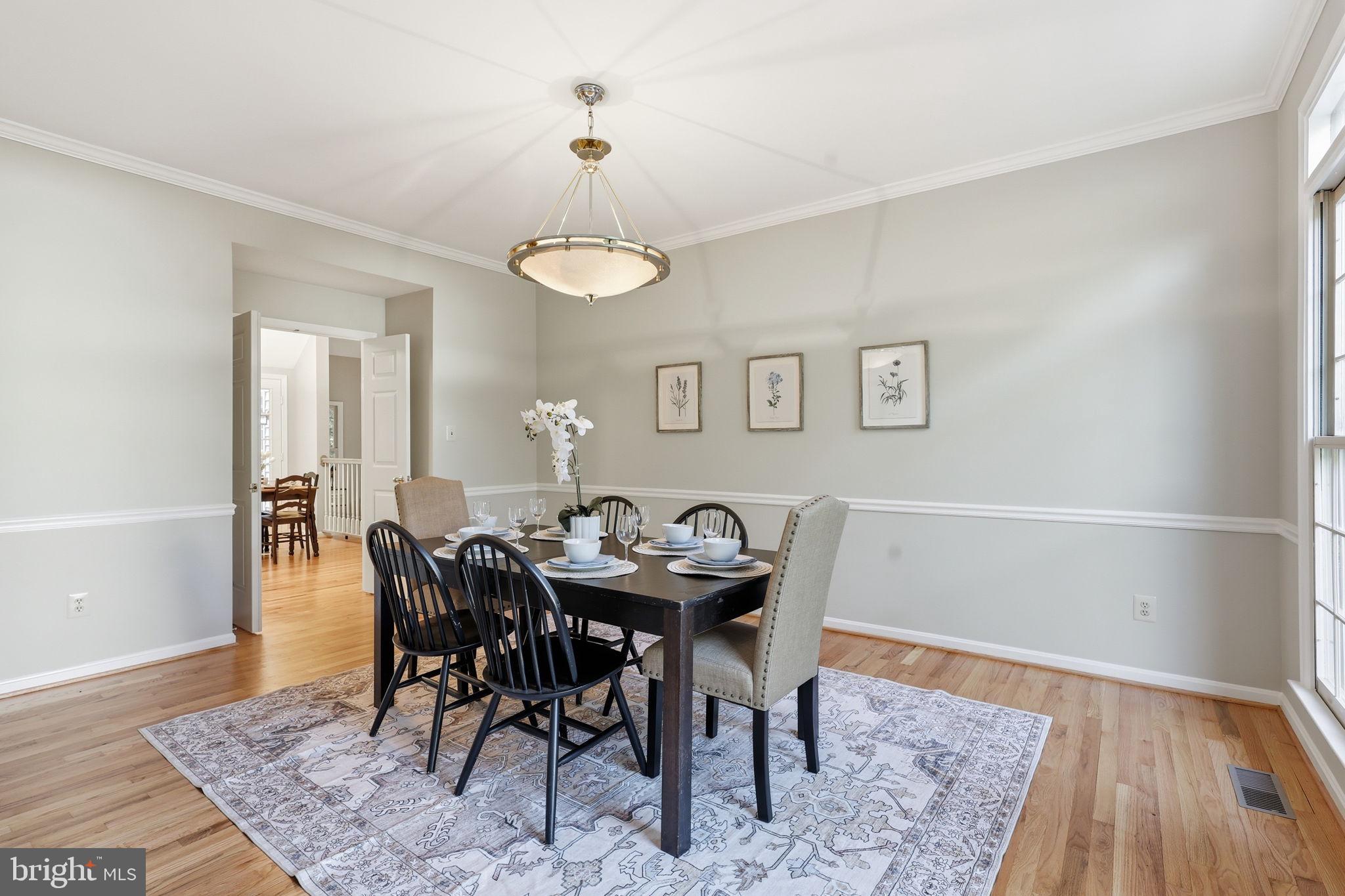 8556 Hooes Road Springfield, VA 22153 - Photo 7 of 57 Spacious eat in dining room w/ crown molding!
