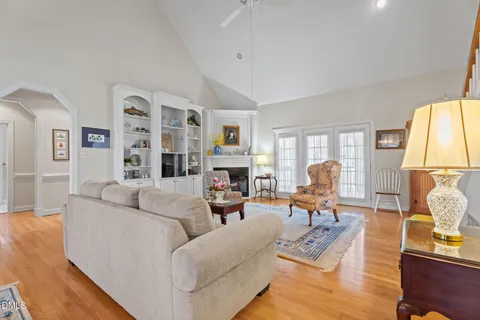 a bedroom with a bed and ceiling fan