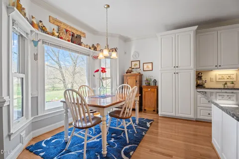 a kitchen with stainless steel appliances granite countertop a refrigerator sink and cabinets