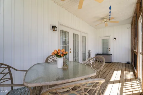 a view of a chairs on the roof deck