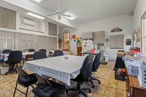 a view of a dining room with furniture