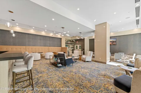 a view of a brick building with large windows