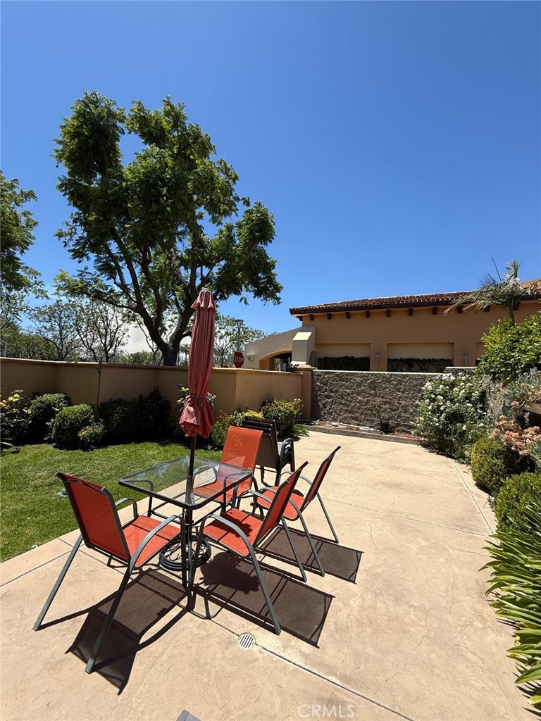 2931 Esperanza Way, Unit B Simi Valley, CA 93063 - Photo 24 of 49 a view of a swimming pool with lawn chairs and plants