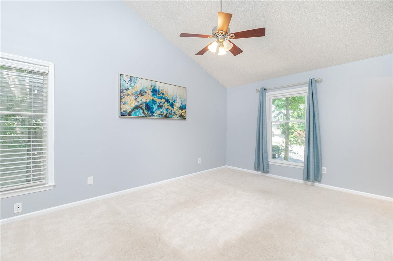 3 Bay Ridge Court Durham, NC 27707 - Photo 16 of 25 Vaulted ceilings and multiple windows make this an ideal owner's retreat.