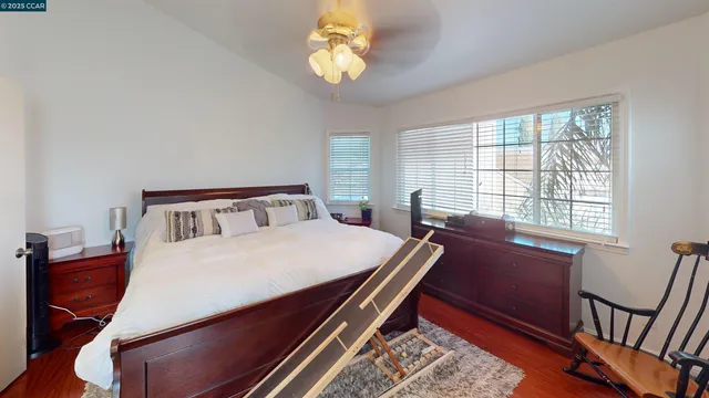 a view of a patio with couches chairs and potted plants