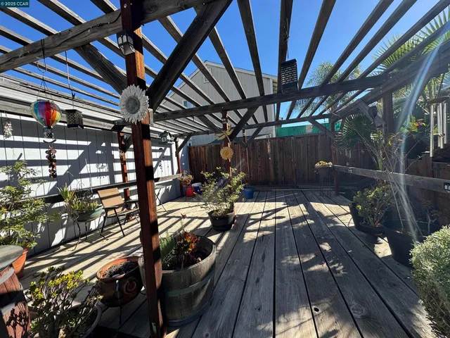 a view of backyard with a table and chairs
