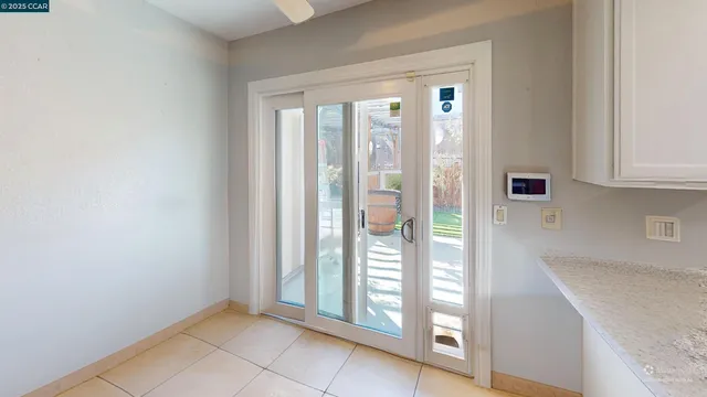 a view of a kitchen with an entryway