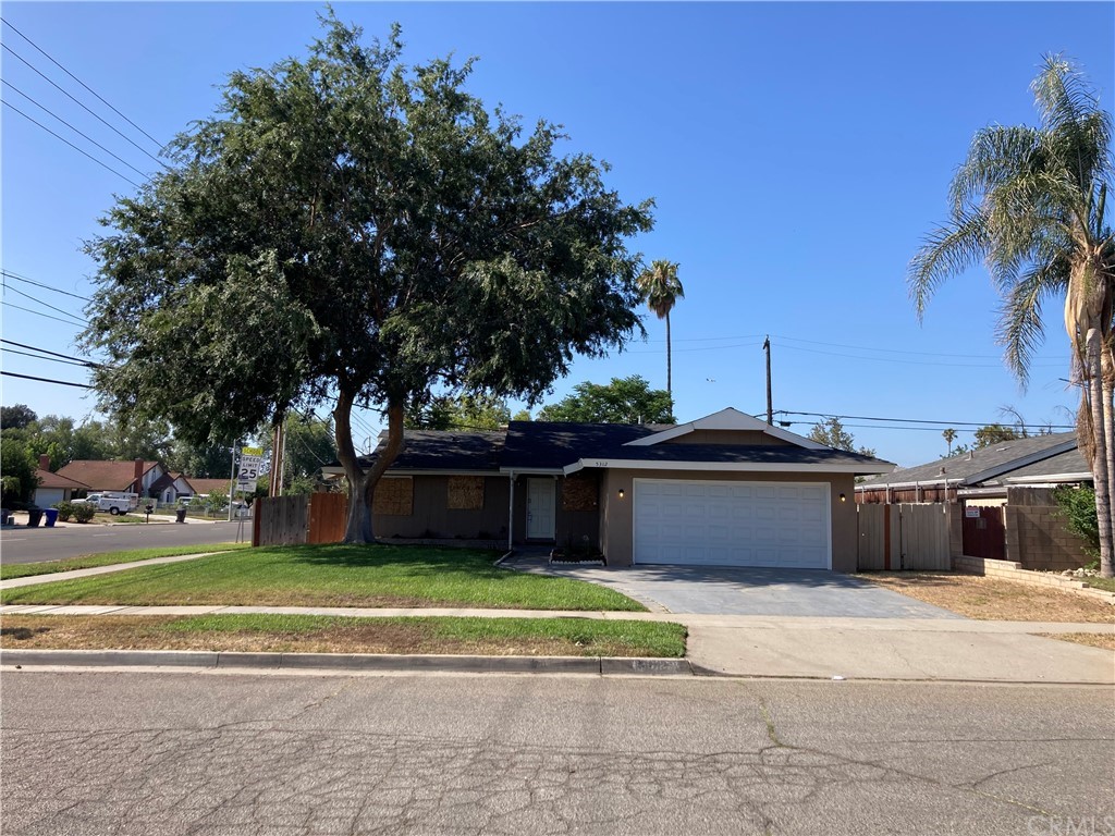 5312 Walter Street Riverside, CA 92504 - Photo 1 of 1 a view of a swimming pool with a yard