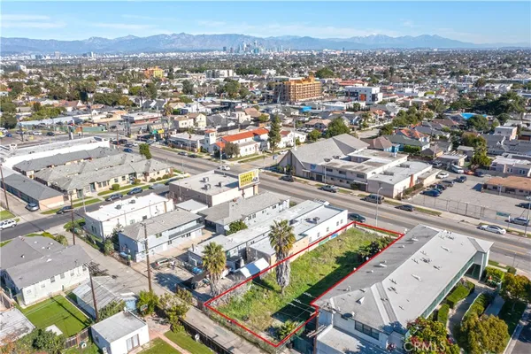 an aerial view of a city with lots of residential buildings