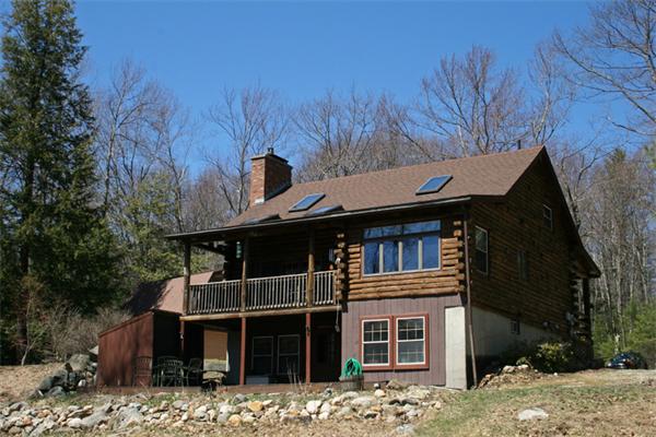 115 Secret Lake Road Phillipston, MA 01331 - Photo 1 of 20 a view of a house with a yard and large tree