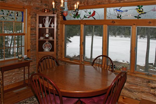 115 Secret Lake Road Phillipston, MA 01331 - Photo 5 of 20 a view of a dining room with furniture window and outside view