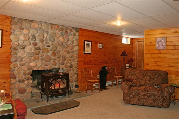 115 Secret Lake Road Phillipston, MA 01331 - Photo 8 of 20 a living room with furniture and a fireplace