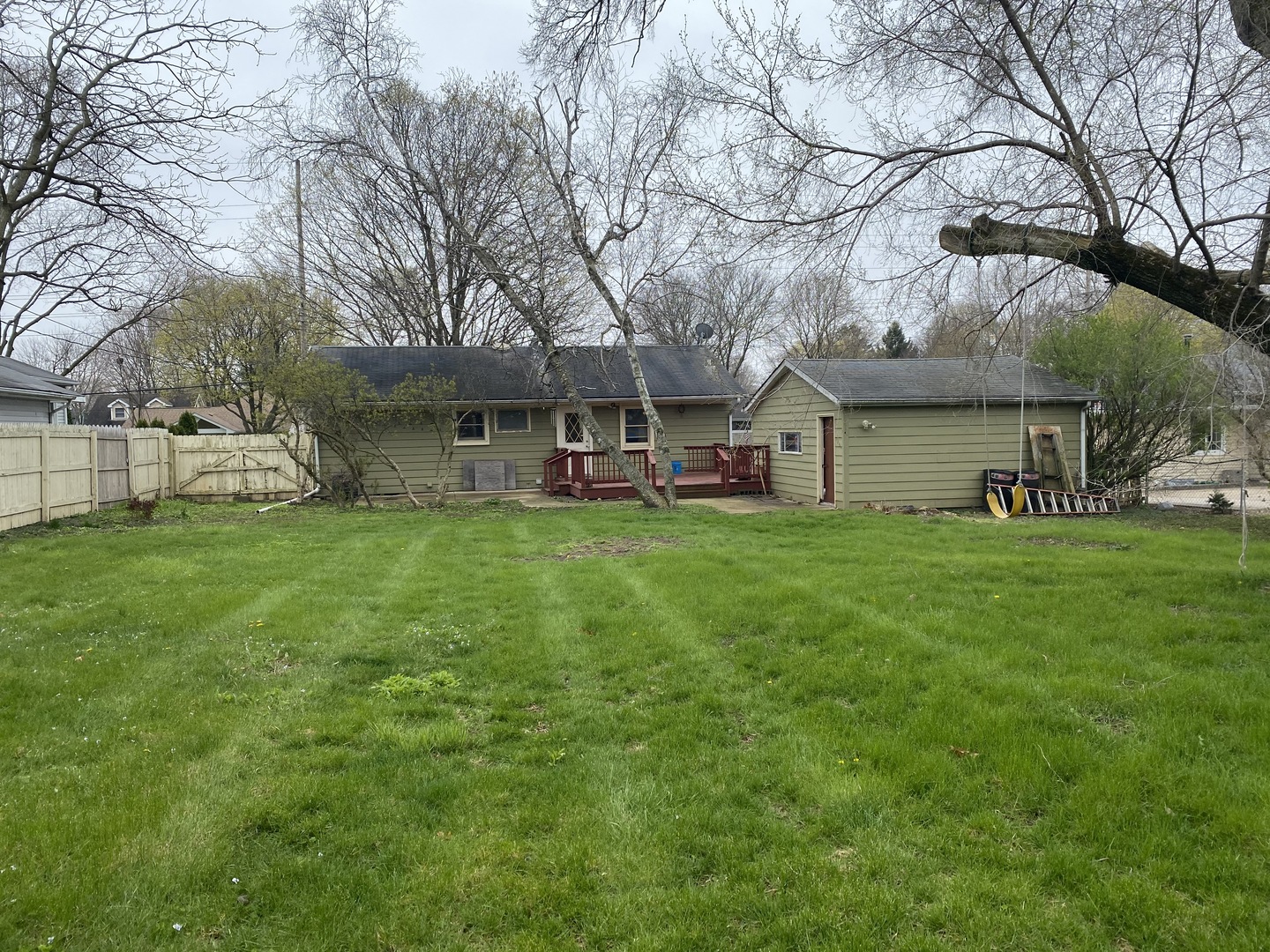 329 Douglas Road Batavia, IL 60510 - Photo 22 of 23 a view of a house with a big yard and large trees