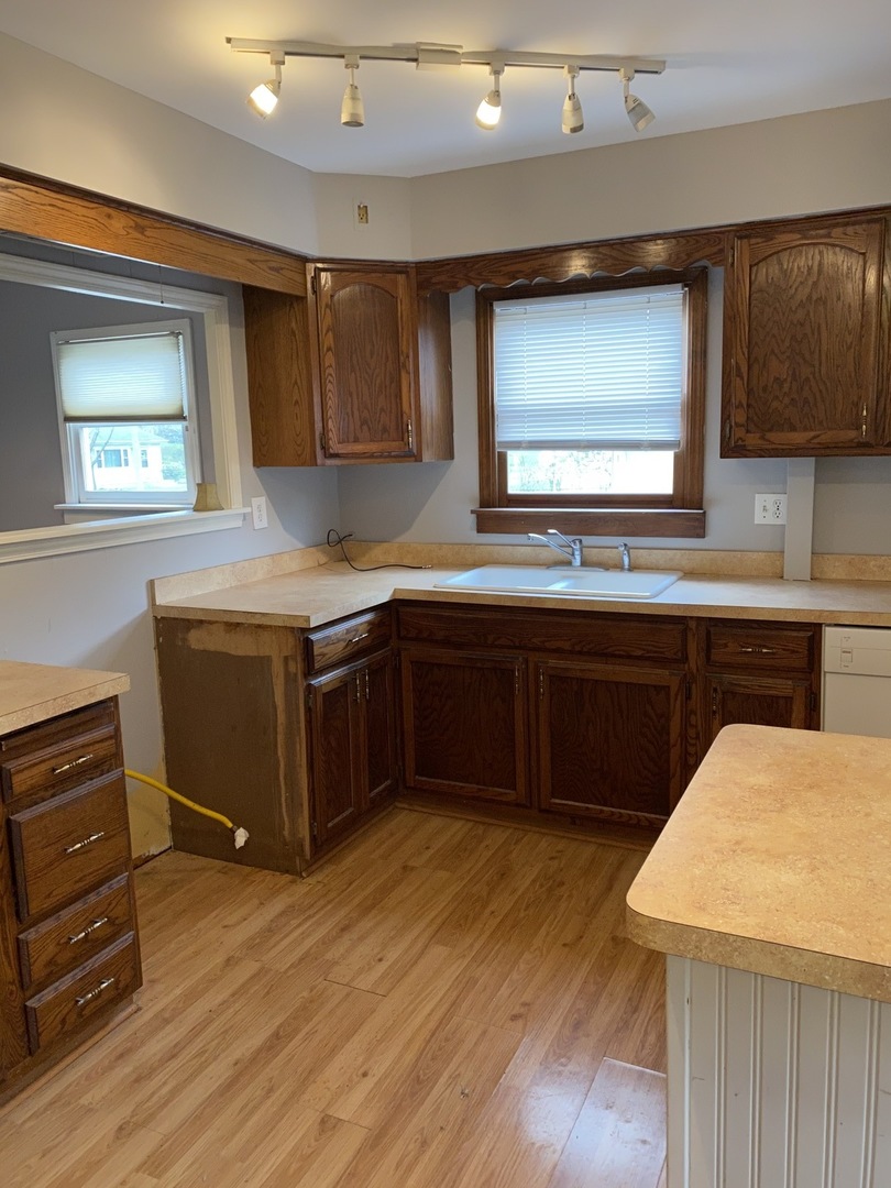 329 Douglas Road Batavia, IL 60510 - Photo 6 of 23 a kitchen with a sink and cabinets