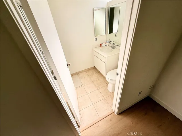 a bathroom with a sink a toilet and bathtub
