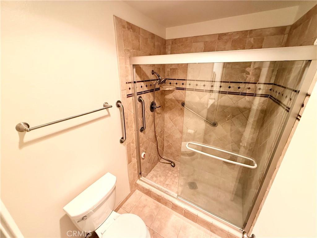 15 Rana Irvine, CA 92612 - Photo 14 of 15 a bathroom with a shower and toilet