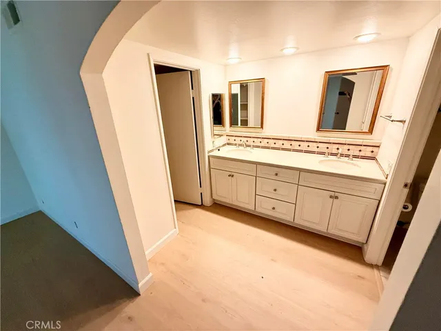 a view of a hallway with windows