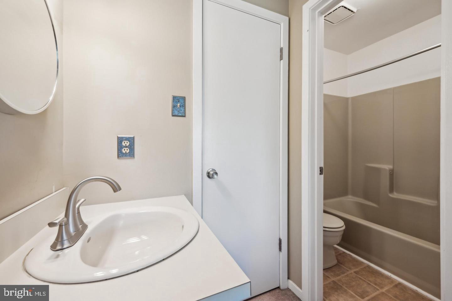 502 Gregorys Way Voorhees, NJ 08043 - Photo 7 of 8 a bathroom with a sink and a mirror