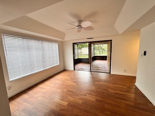 8331 Southwest 39th Court, Unit 8331 Fort Lauderdale, FL 33328 - Photo 14 of 44 a view of an empty room with a window and wooden floor