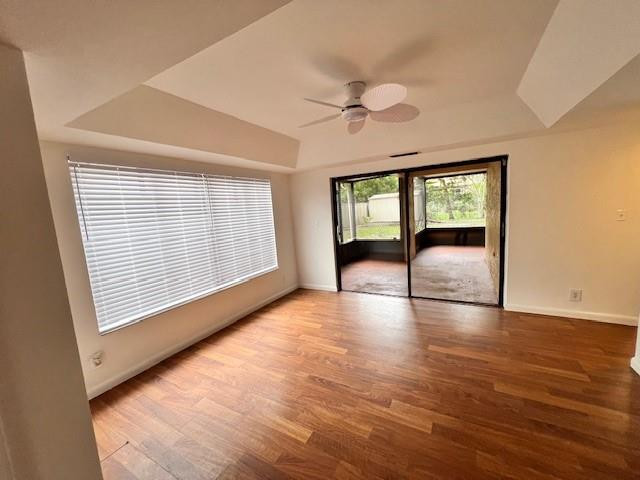 8331 Southwest 39th Court, Unit 8331 Fort Lauderdale, FL 33328 - Photo 15 of 44 an empty room with wooden floor and windows