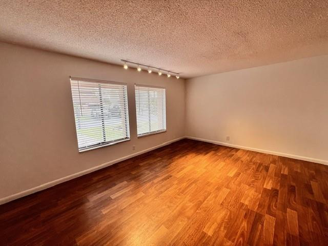 8331 Southwest 39th Court, Unit 8331 Fort Lauderdale, FL 33328 - Photo 17 of 44 an empty room with wooden floor and windows