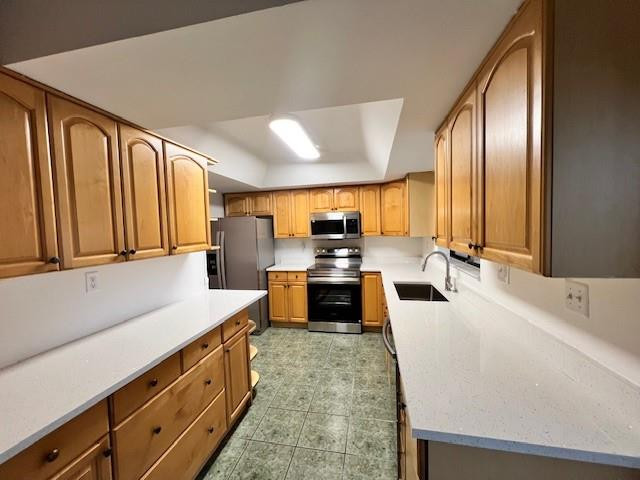8331 Southwest 39th Court, Unit 8331 Fort Lauderdale, FL 33328 - Photo 2 of 44 a large kitchen with stainless steel appliances a large counter top a stove a chimney a sink and a large window