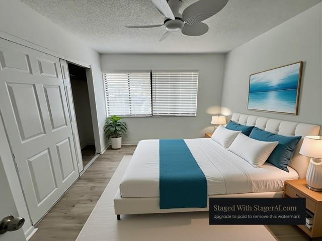 8331 Southwest 39th Court, Unit 8331 Fort Lauderdale, FL 33328 - Photo 29 of 44 a bedroom with a large bed and a window