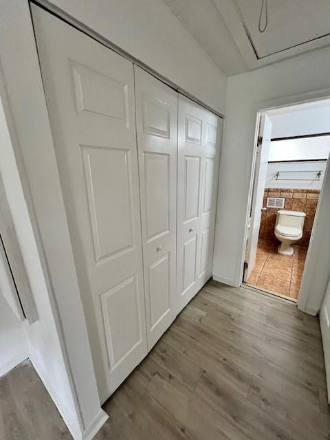 8331 Southwest 39th Court, Unit 8331 Fort Lauderdale, FL 33328 - Photo 32 of 44 a view of an empty room with wooden floor and a window