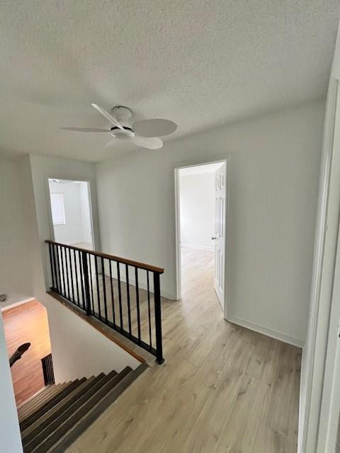 8331 Southwest 39th Court, Unit 8331 Fort Lauderdale, FL 33328 - Photo 37 of 44 an empty room with wooden floor fan and windows