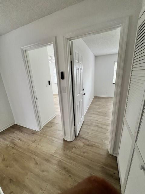 8331 Southwest 39th Court, Unit 8331 Fort Lauderdale, FL 33328 - Photo 38 of 44 a view of a hallway with wooden floor