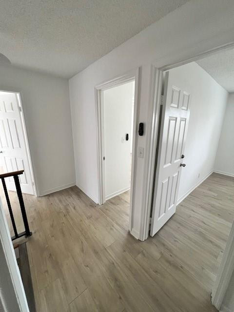 8331 Southwest 39th Court, Unit 8331 Fort Lauderdale, FL 33328 - Photo 39 of 44 an empty room with wooden floor and staircase