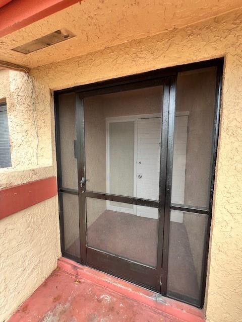 8331 Southwest 39th Court, Unit 8331 Fort Lauderdale, FL 33328 - Photo 40 of 44 a closeup of the door of a house