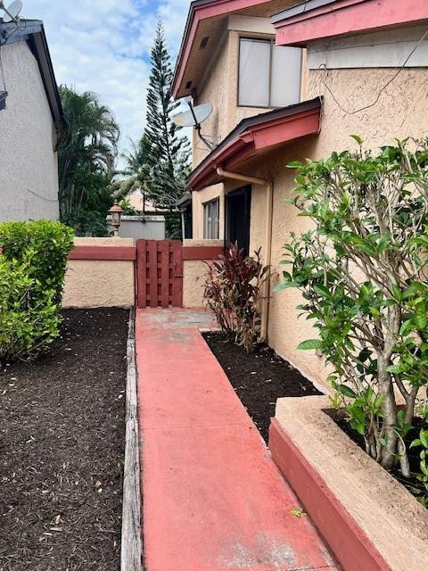 8331 Southwest 39th Court, Unit 8331 Fort Lauderdale, FL 33328 - Photo 41 of 44 a front view of a house with a yard