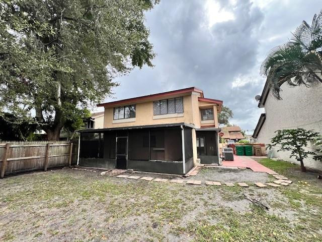 8331 Southwest 39th Court, Unit 8331 Fort Lauderdale, FL 33328 - Photo 43 of 44 a front view of a house with a yard