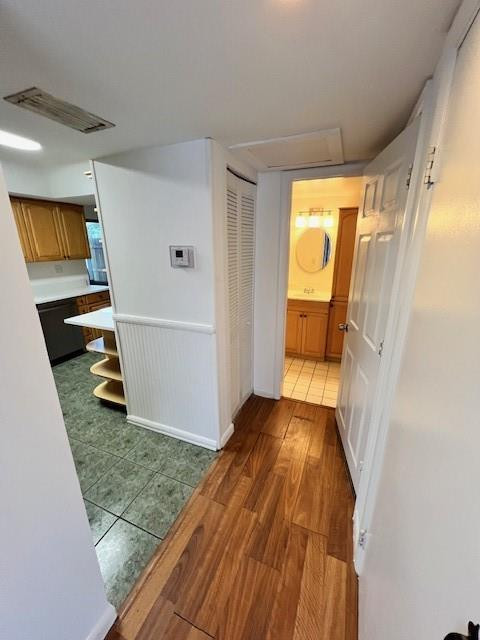 8331 Southwest 39th Court, Unit 8331 Fort Lauderdale, FL 33328 - Photo 5 of 44 a view of a hallway to a house with wooden floor and stairs