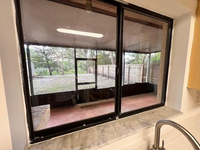 8331 Southwest 39th Court, Unit 8331 Fort Lauderdale, FL 33328 - Photo 8 of 44 a view of a floor to ceiling window in a room