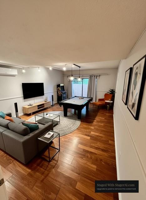 8331 Southwest 39th Court, Unit 8331 Fort Lauderdale, FL 33328 - Photo 10 of 44 a living room with furniture and a flat screen tv