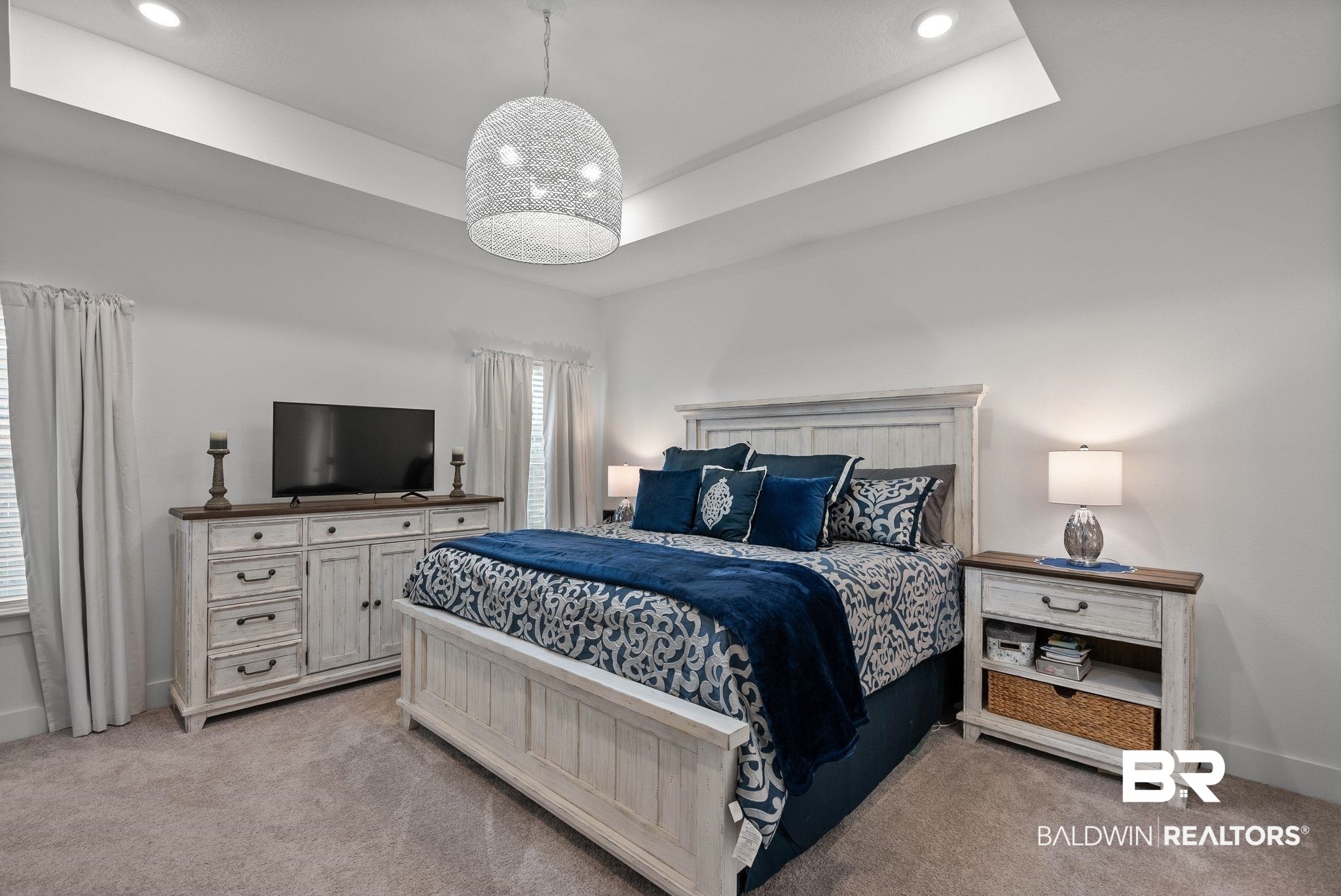 9899 Willet Way Foley, AL 36535 - Photo 15 of 37 Recessed tray ceiling with central pendant lighting