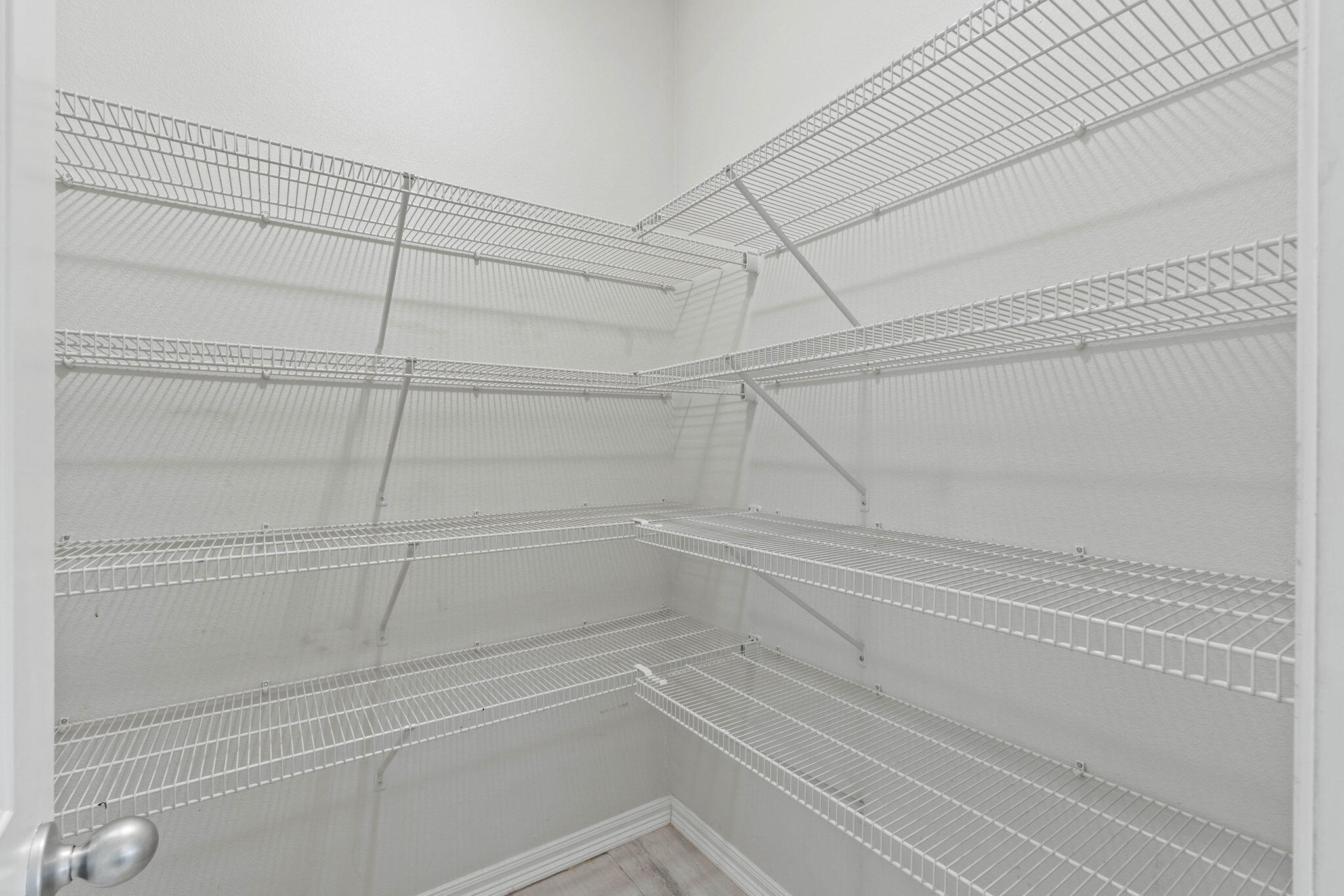 6000 Fiori Drive Crestview, FL 32539 - Photo 14 of 44 a view of a room with racks on the wall