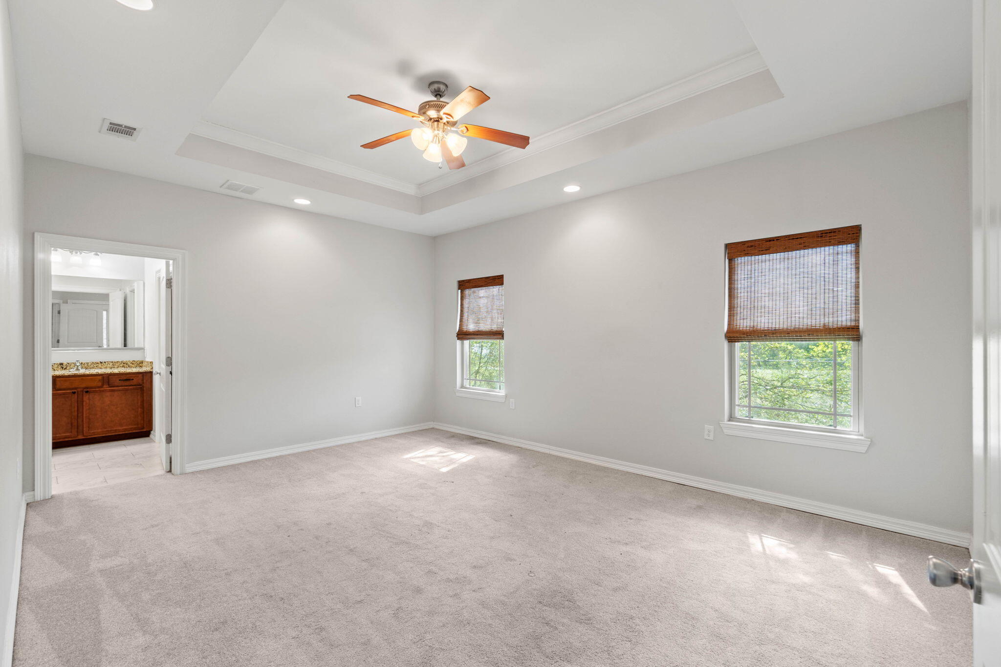 6000 Fiori Drive Crestview, FL 32539 - Photo 22 of 44 an empty room with windows and fan
